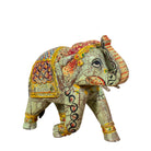 Hand‑painted green wooden elephant decoration with colourful folk art motifs, a unique Indian home accessory and vintage home decor accent.