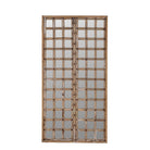 White background picture of a antique teakwood mirror made from a traditional Indian door with iron details and mirror inlays – perfect as a reclaimed wood mirror for vintage home decor.