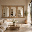 Arched wooden mirror Yosha made from an antique Indian teak window frame with triple arches and carved columns. A piece of unique Indian furniture with bold scale and rustic heritage charm.