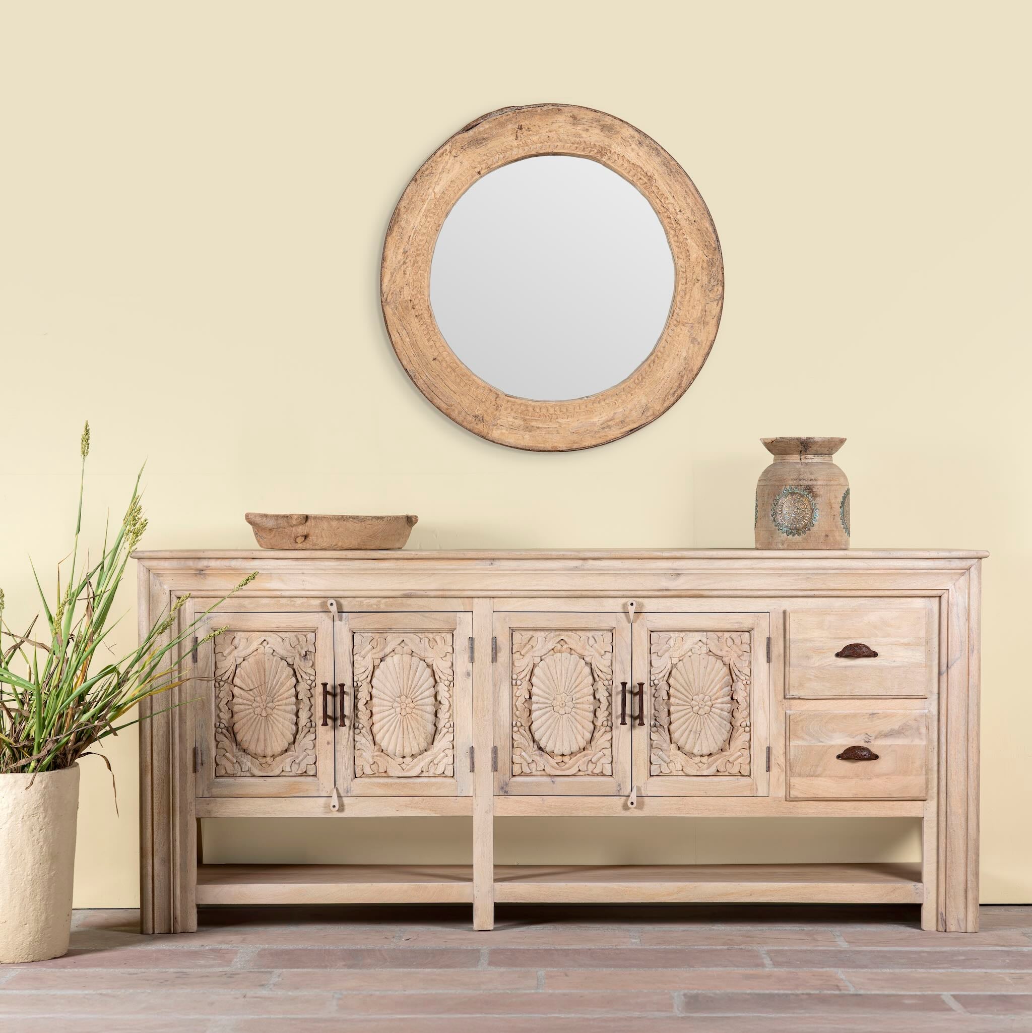 Hand-carved mango wood console table Zahira with 2 drawers and 4 doors in a natural finish. Elegant living room furniture piece with artistic detailing and practical storage.
