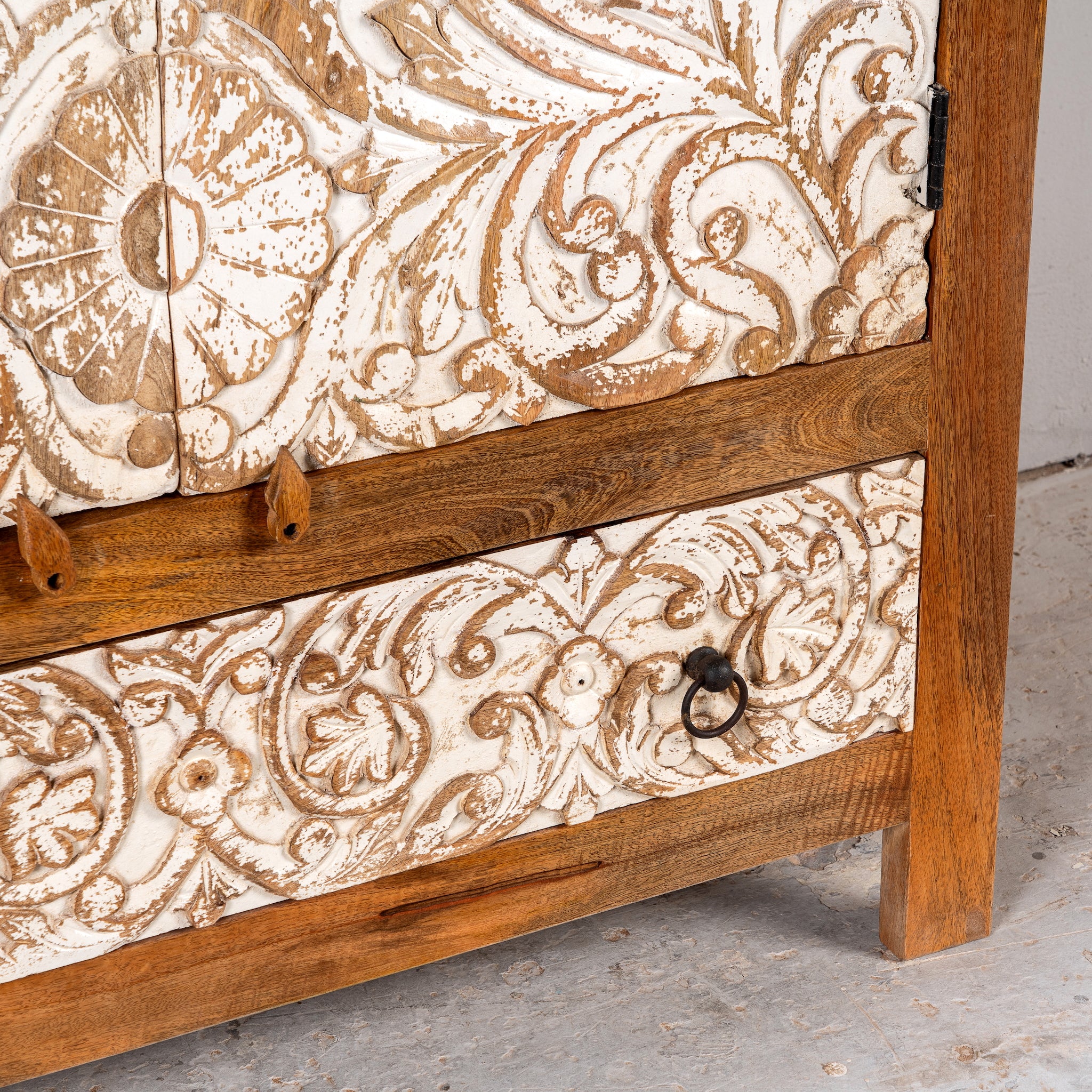 Hand-carved mango wood wardrobe with whitewashed floral motifs – Zashil by Om Home & Garden, a Mediterranean-inspired piece of carved wooden furniture.
