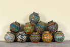 Hand-painted papier-mâché vases from India with floral folk-art designs in vibrant mixed colors. Unique Indian decor and decorative art objects handcrafted using traditional methods.