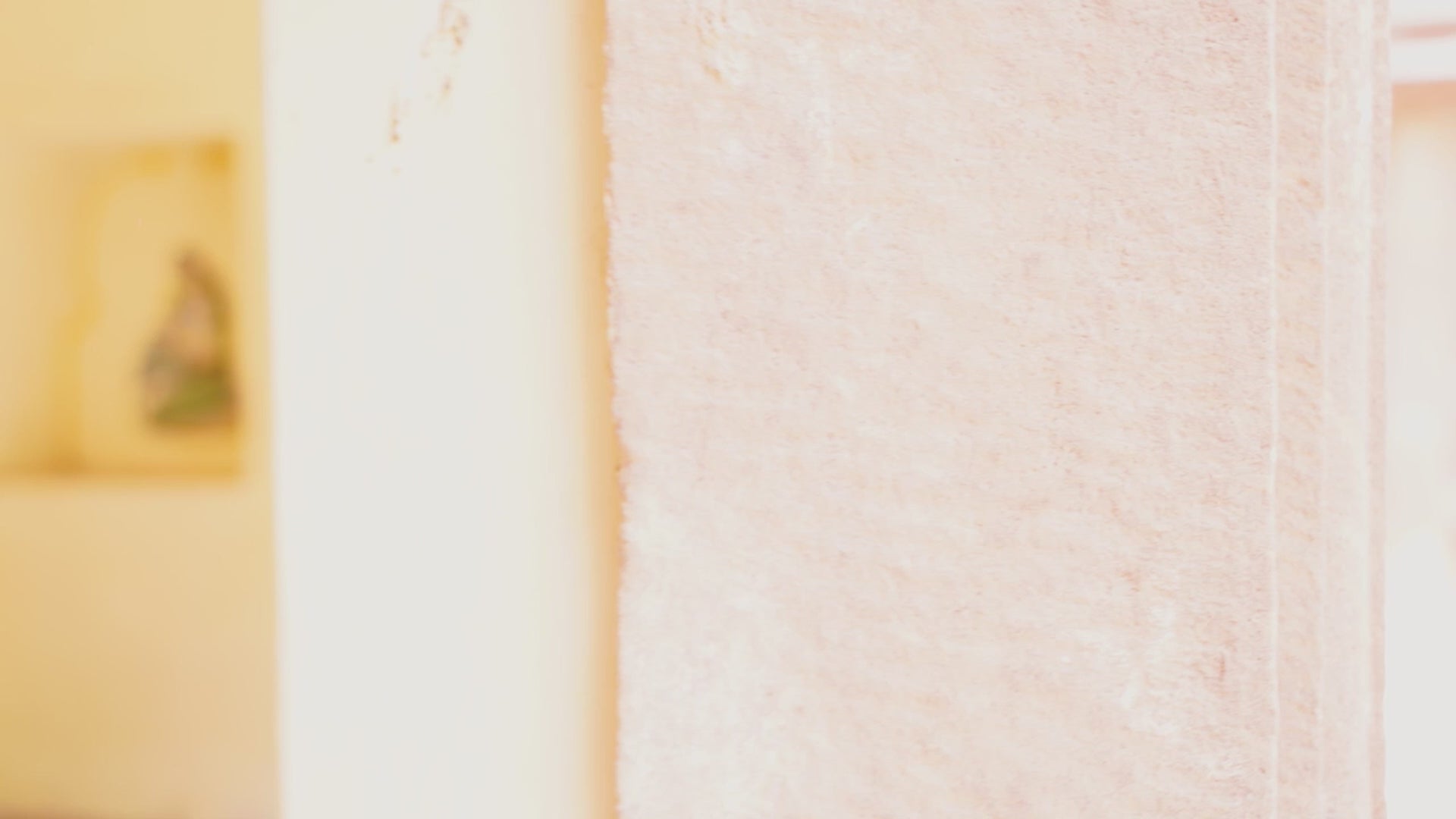 Reel showing a carved wood mirror Anushara made from hand-carved mango wood with floral motifs and distressed finish. A bold piece of living room furniture ideal for boho and coastal-inspired spaces.