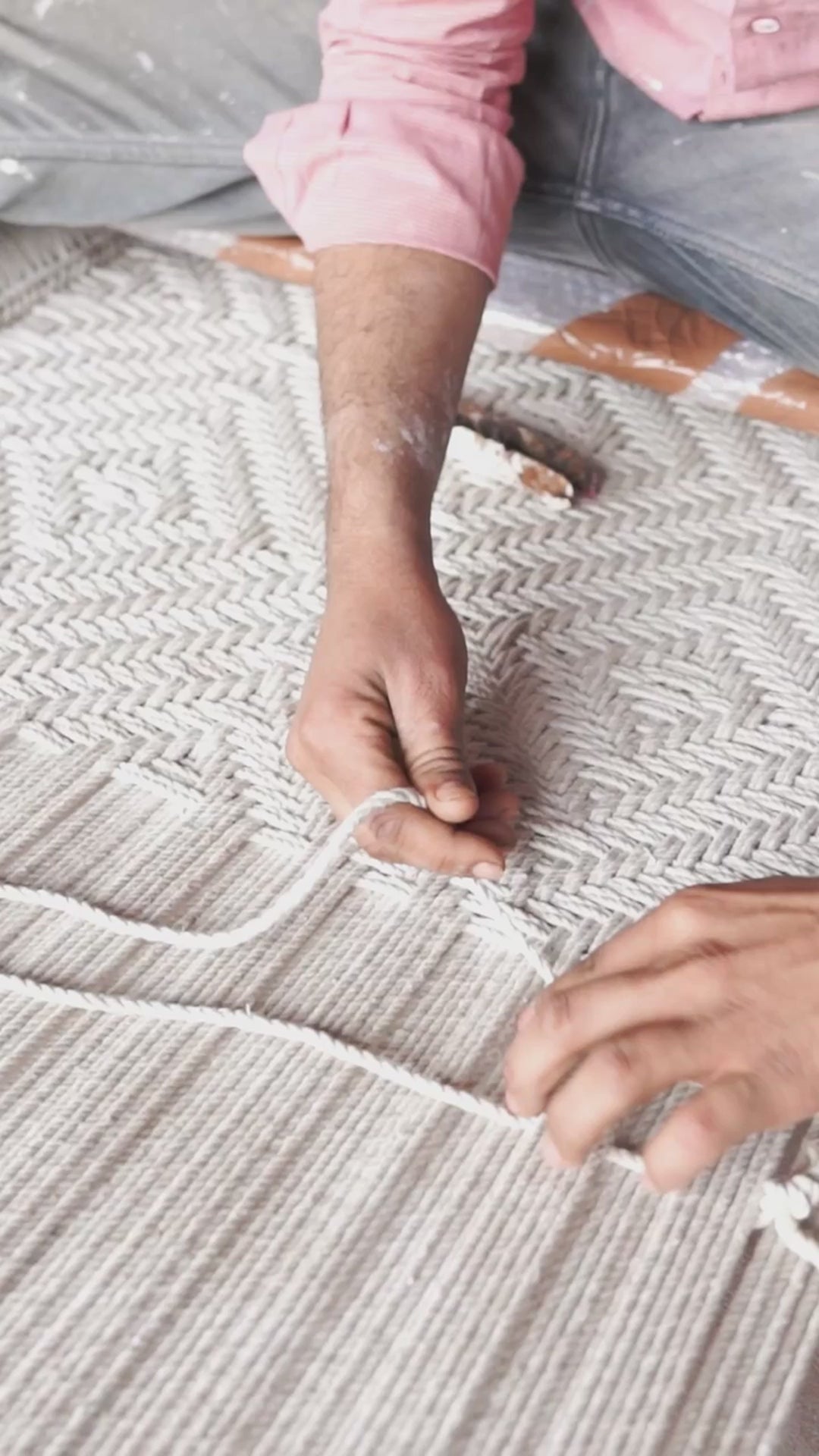 Reel about handy craft on a handwoven Indian Charpai bed Simran with reclaimed teak frame and carved legs; perfect for Indian home decor, 170 × 105 × 45 cm.