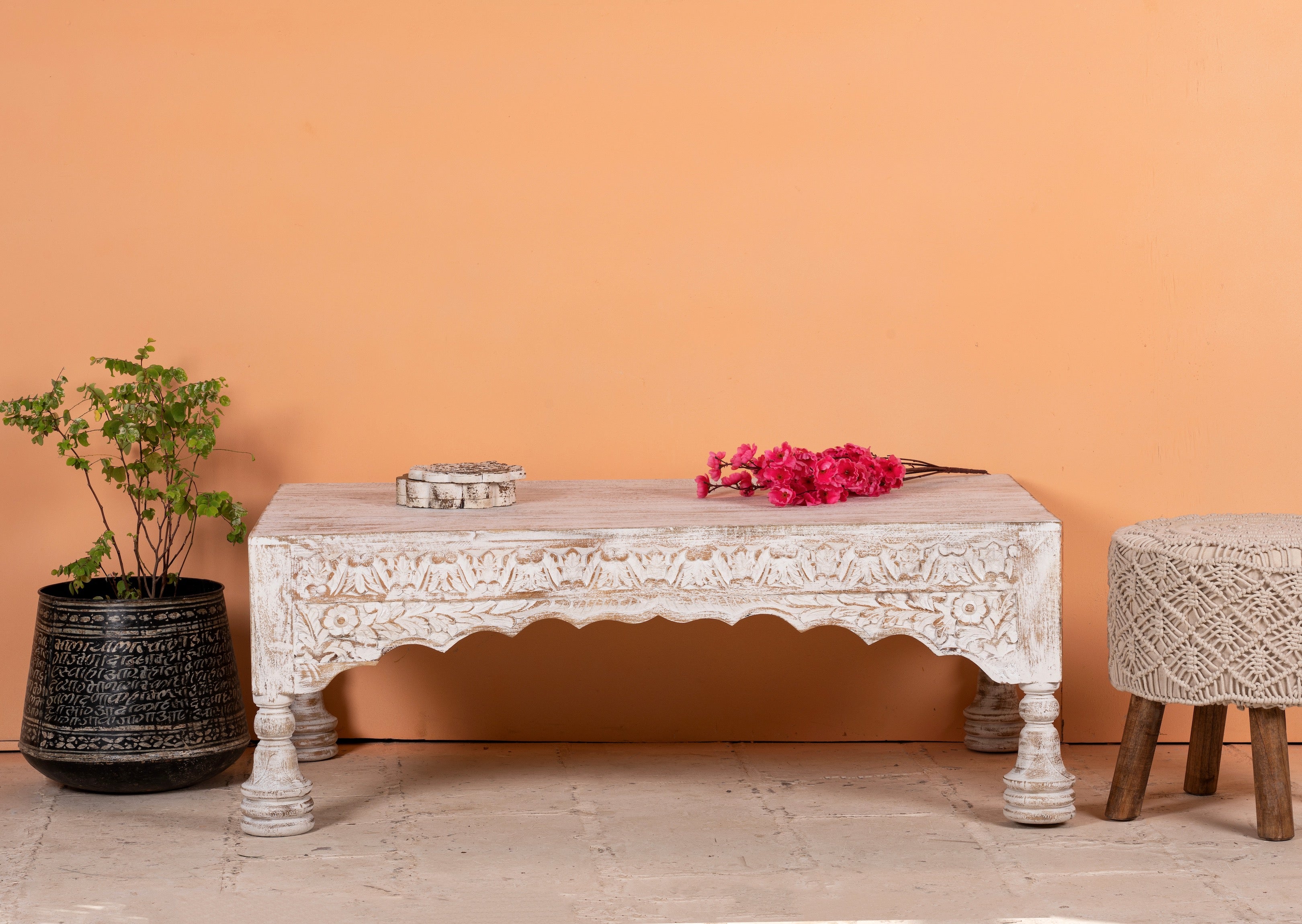 Dhola handcrafted solid mango wood coffee table with intricately hand-carved floral patterns, natural wood grain, and artisan craftsmanship, 120cm.