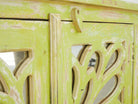 Close up image of a Green Star hand carved mango wood sideboard with floral carvings and mirrored glass doors 180cm