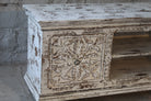 Close up image of a Harsh hand carved mango wood TV unit with Indian carved doors 150cm