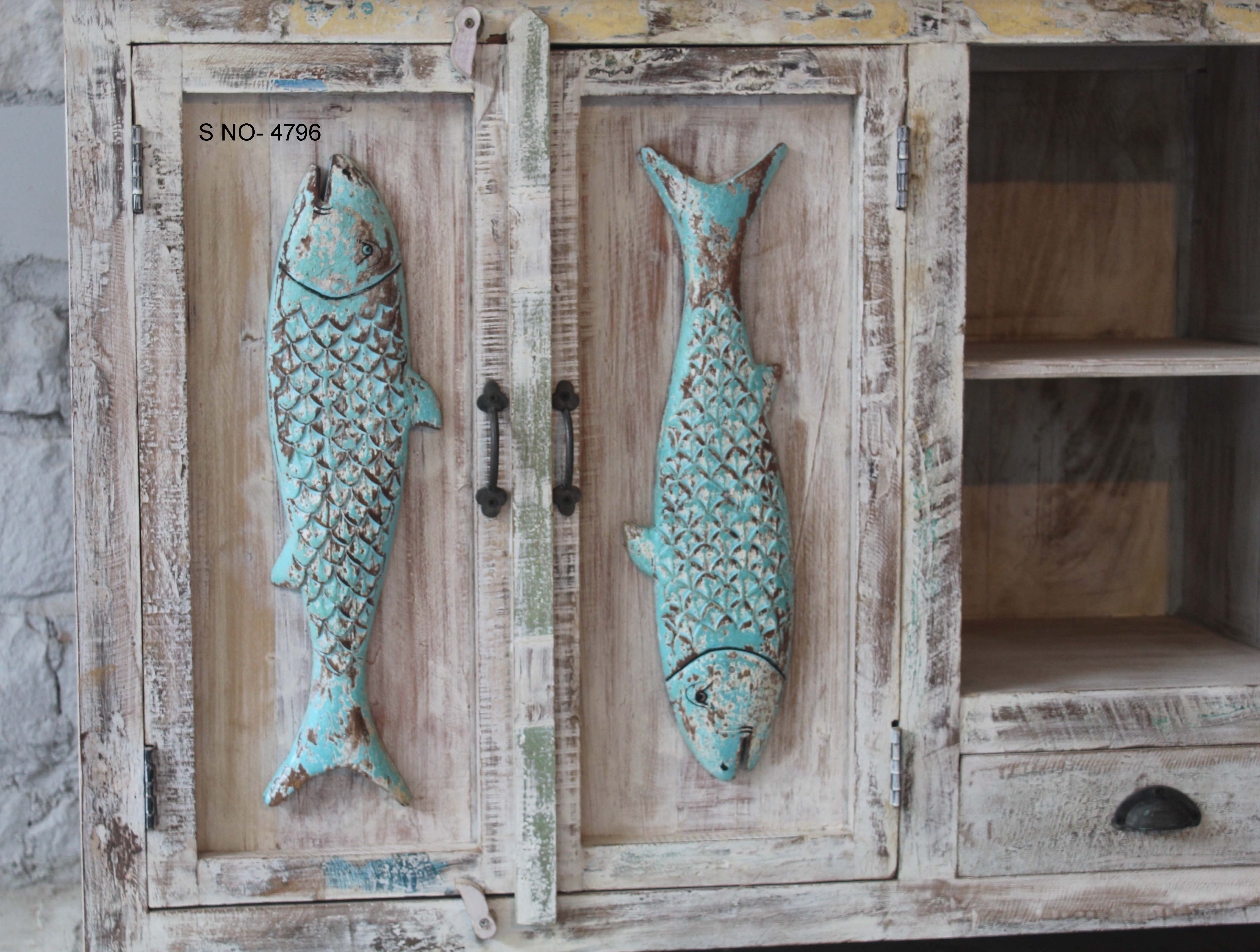 Close up image of a Jhund hand carved mango wood sideboard with blue fish motif doors 184cm