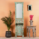 Green shabby-style mirror stand Kalapet made of reclaimed wood with one drawer and distressed finish. A unique Indian furniture piece perfect for vintage home decor.