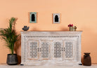 Rajula handcrafted solid mango wood sideboard with hand-carved floral doors, whitewashed finish, four spacious storage compartments, and traditional Indian craftsmanship, 180cm.