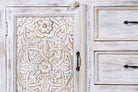 Close up image of a mediterranean-style carved sideboard in solid mango wood with floral motifs and elegant legs; ideal for vintage home decor, 150 × 90 × 40 cm.