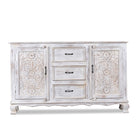 White background image of a mediterranean-style carved sideboard in solid mango wood with floral motifs and elegant legs; ideal for vintage home decor, 150 × 90 × 40 cm.