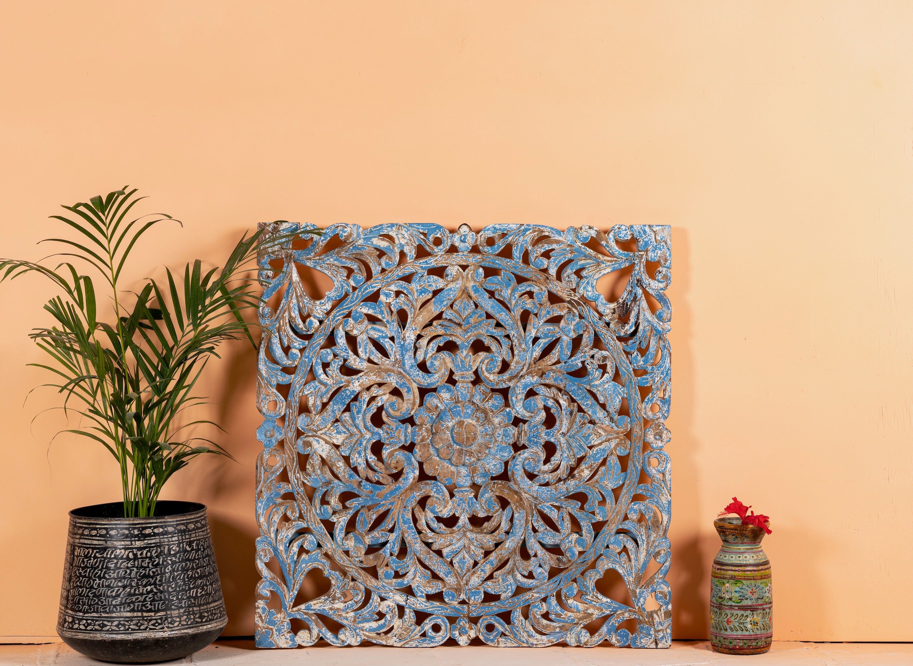 Shay carved wooden wall panel made from mango wood with soft floral hand-carving—an artisan wooden wall decoration with natural beauty and handcrafted detail.