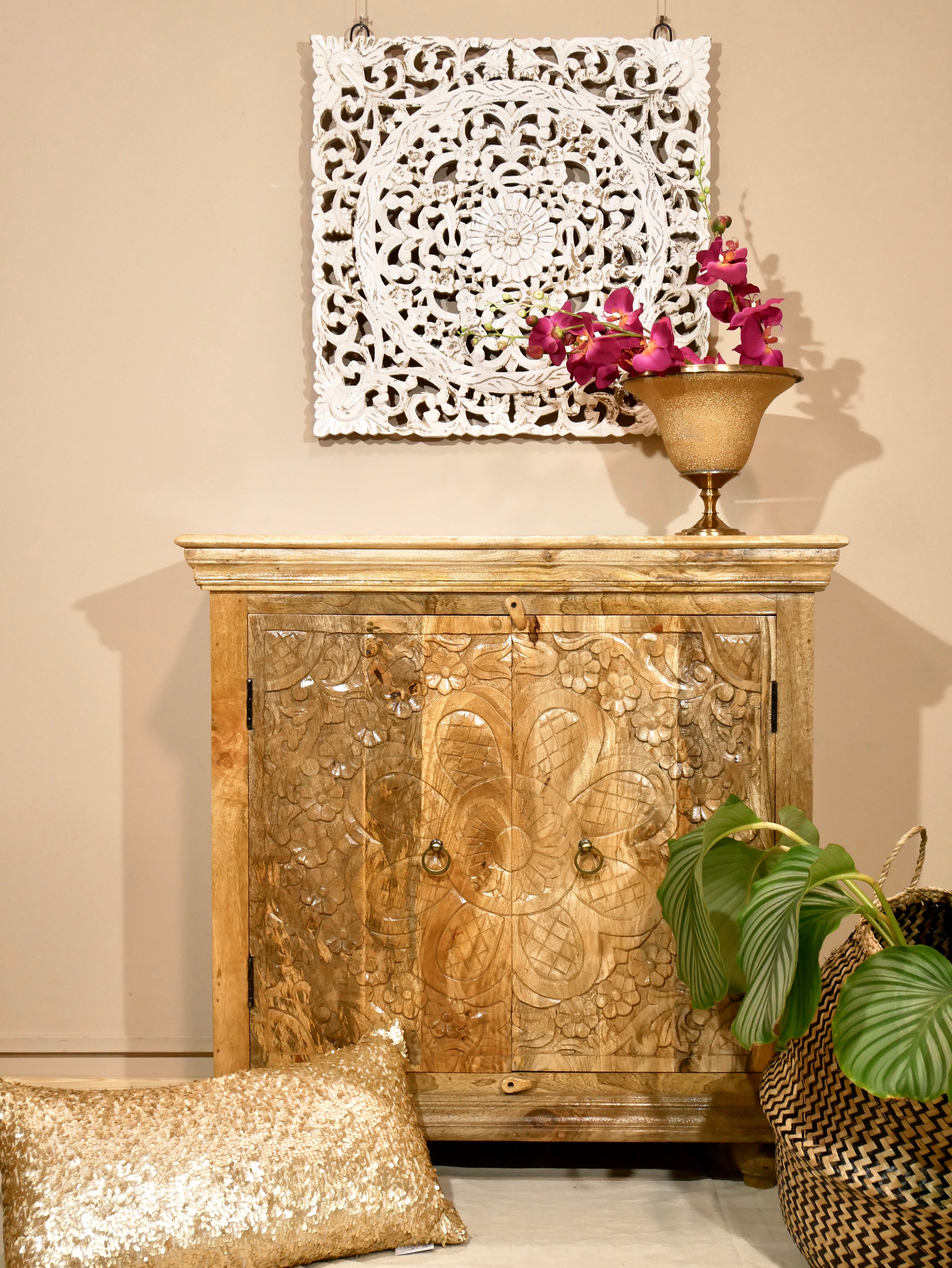 Boho style mango wood furniture cabinet with hand-carved floral doors, Mediterranean-inspired design, 90 × 90 × 40 cm.