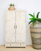 Hand-painted iron floor vase with Sanskrit motifs – a one-of-a-kind painted iron decoration perfect for bohemian interior styling.